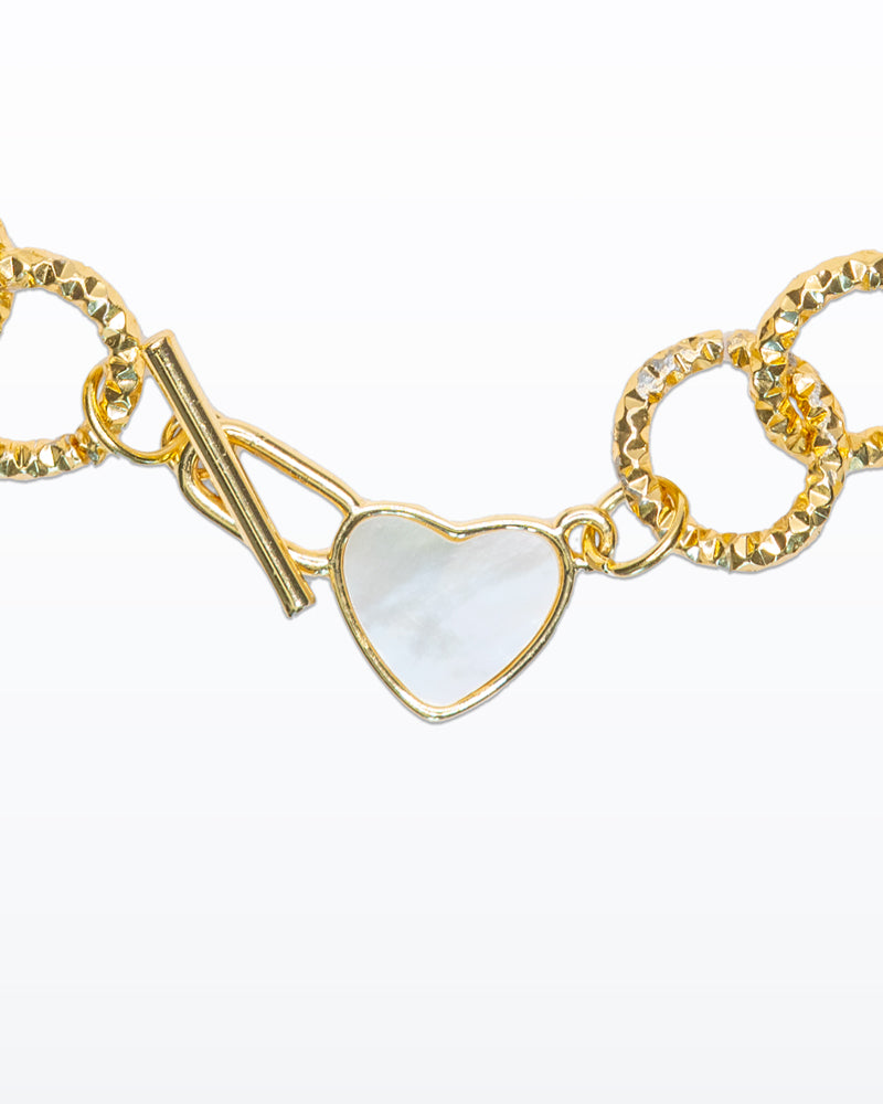 Croce e Cuore – Collana oro con cristalli luminosi